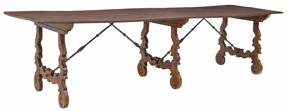 <b>Spanish Baroque-Style Oak Trestle Dining Table</b><br>  Plank top, carved trestle base w/scrolled iron cross-stretchers<br> approx 31.25 tall x 125 long x 35.5 inches<br> circa 19th cen., Spain 