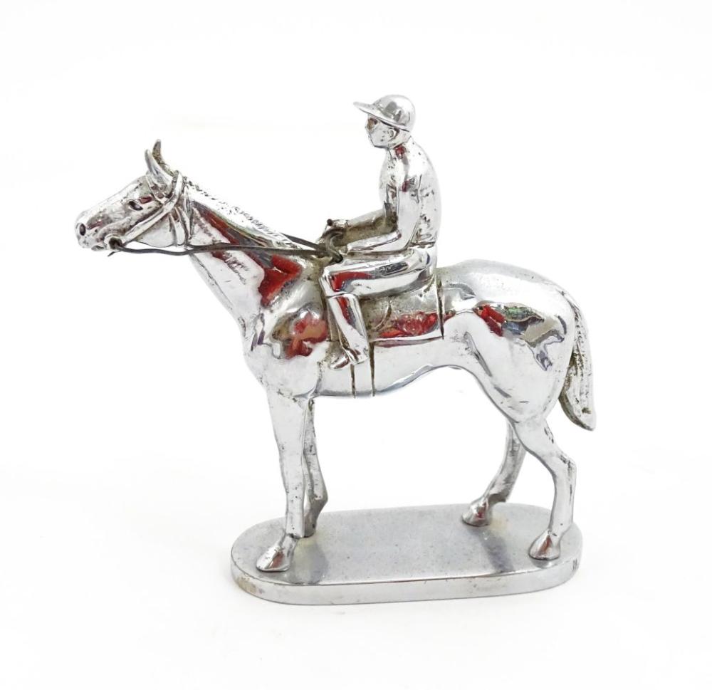 <b>Chrome Hood Ornament</b><br>approx. 4.5 in. T, circa mid-20th cen.
